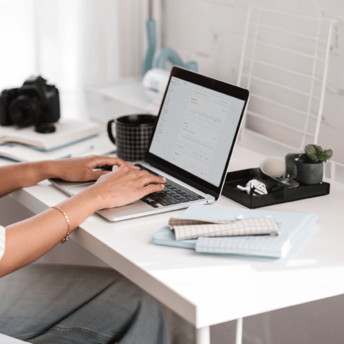 business owner at desk looking at seo growth