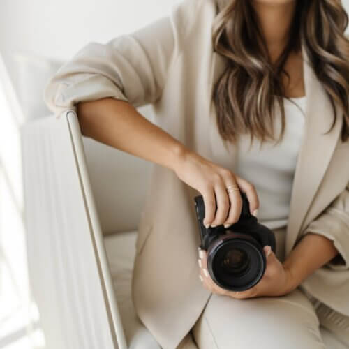 photographer holding a camera during brand shoot
