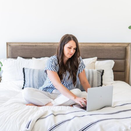 Southern Creative owner, Stephanie O'Keefe working on interior design website adding LTK on WordPress while working from home