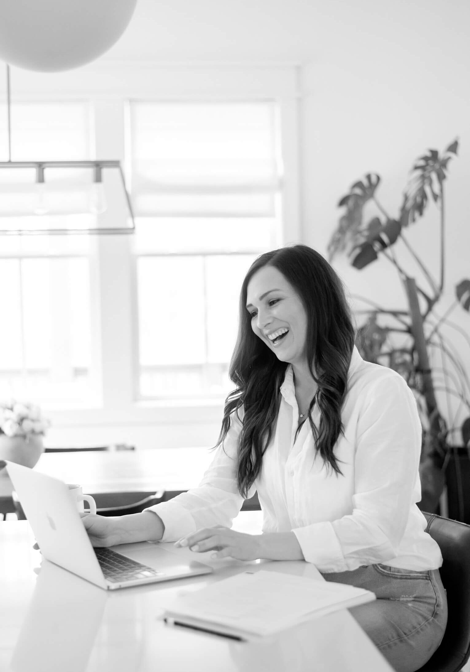 Southern-Creative-Owner-On-Call-With-Seo-Strategist Seo Strategist, Stephanie O'Keefe At Counter On Call With Seo Client In Raleigh, Nc.